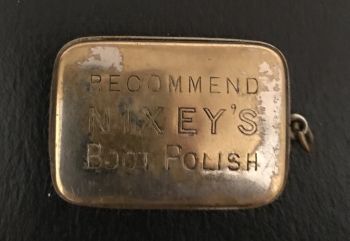 The reverse side of the matchbox engraved with Nixey’s Boot Polish